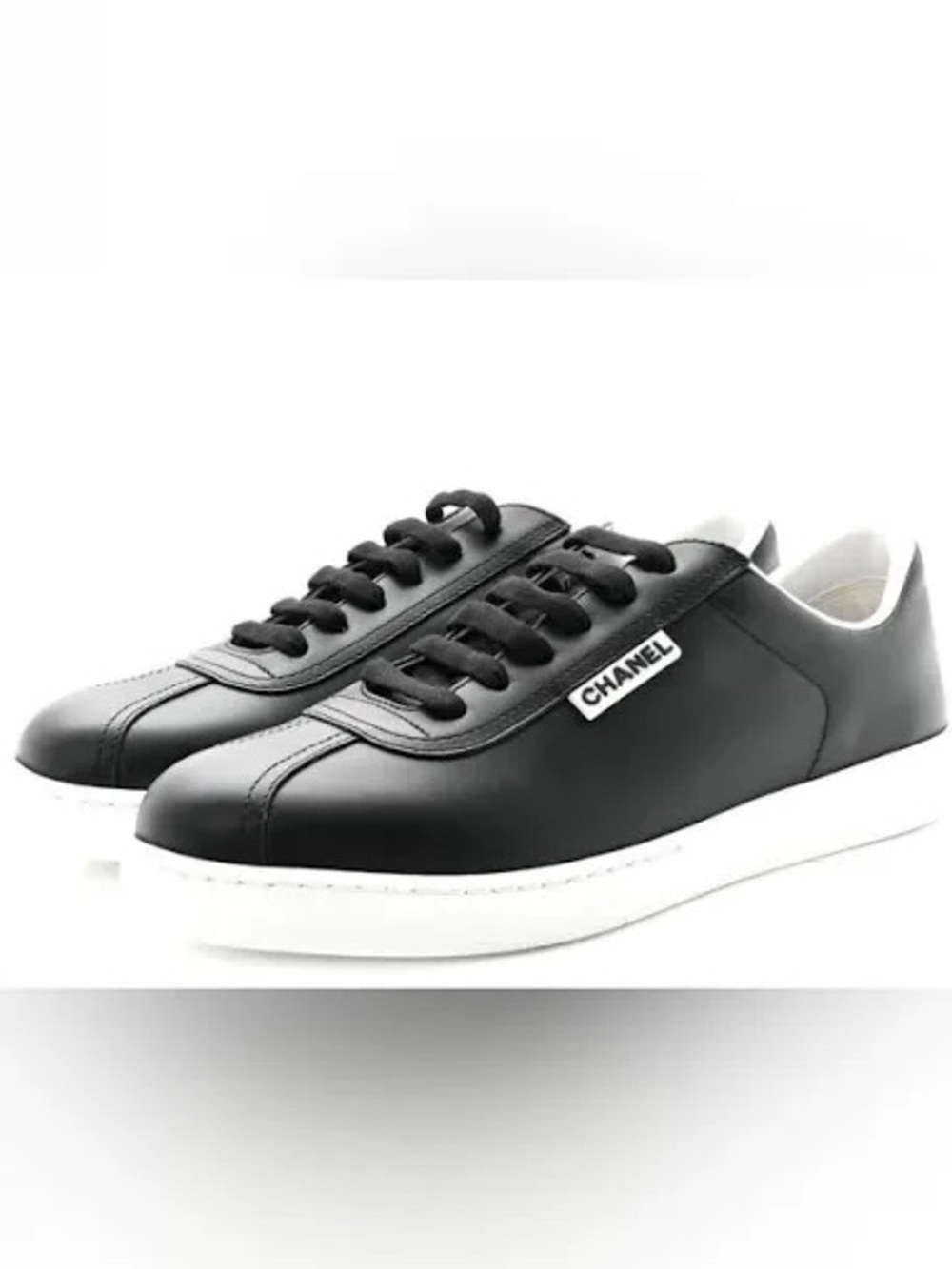 CHANEL Black and White Leather Low-Top Sneakers lightly used